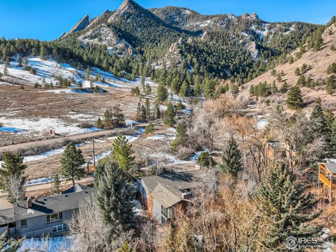421 Baseline Road Boulder, CO 80302 - Photo 3 of 17 a view of a yard with wooden fence
