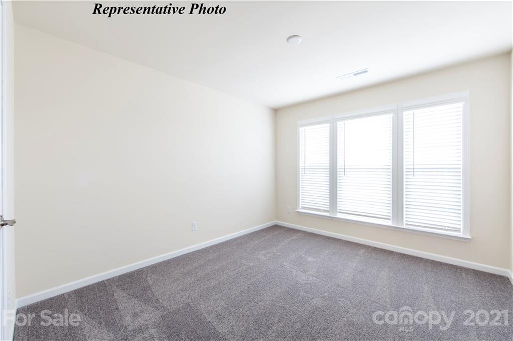 715 Elders Story Road, Unit 344 Fort Mill, SC 29708 - Photo 9 of 19 an empty room with a window
