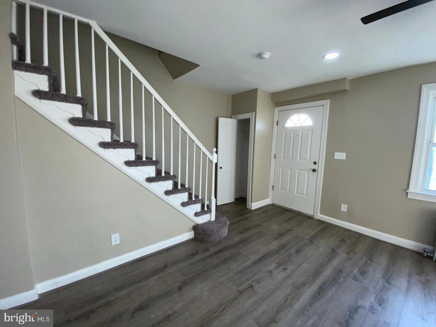 41 North Kossuth Street Baltimore, MD 21229 - Photo 5 of 30 a view of a hallway with wooden floor and entryway