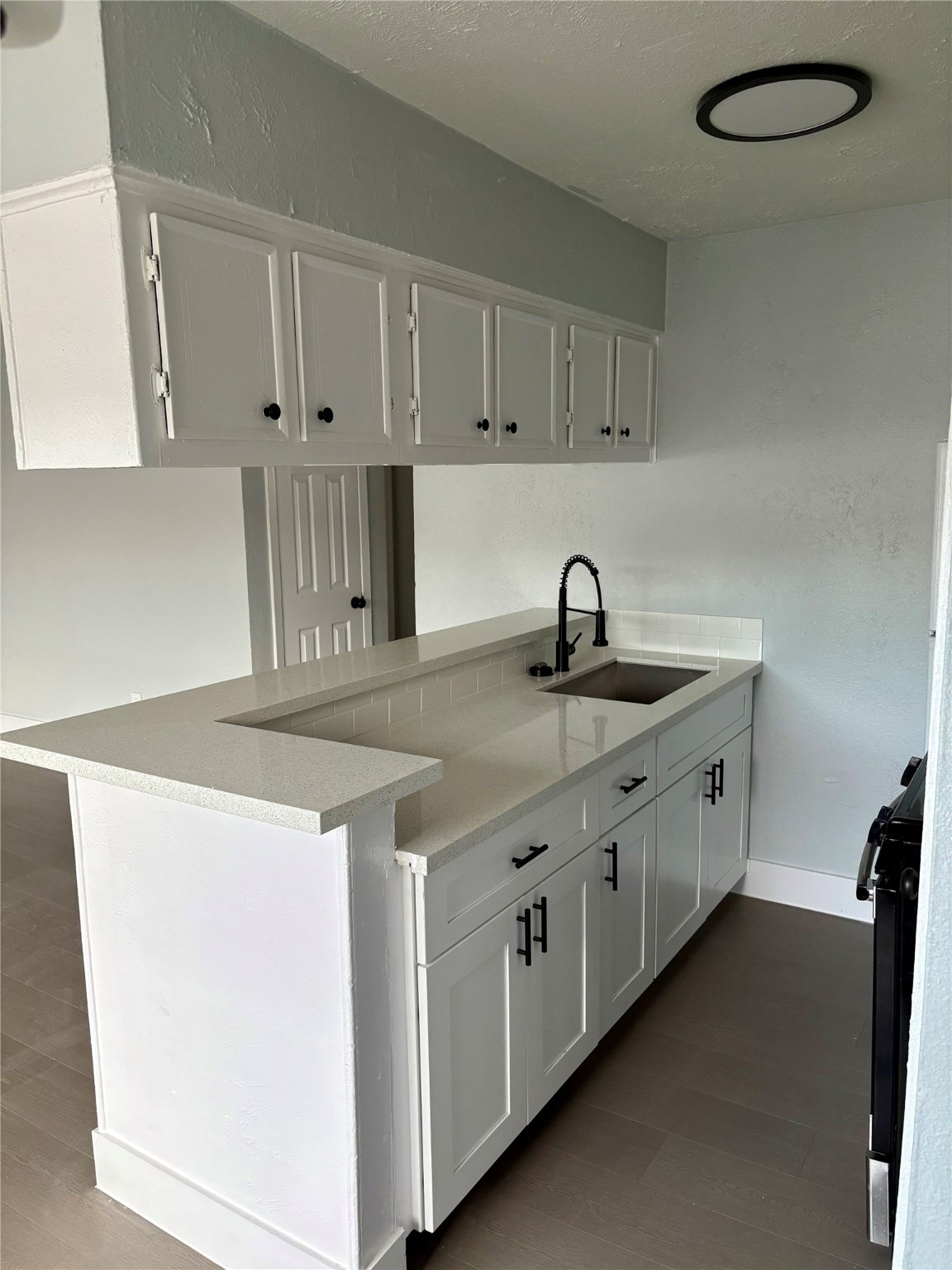 1125 Ann Pasadena, TX 77506 - Photo 3 of 15 a kitchen with sink and cabinets