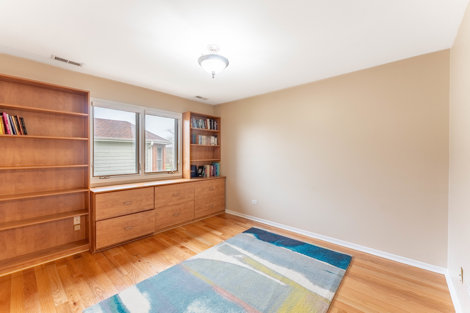 1442 Kinross Street Flossmoor, IL 60422 - Photo 34 of 53 a view of empty room with wooden floor and fan