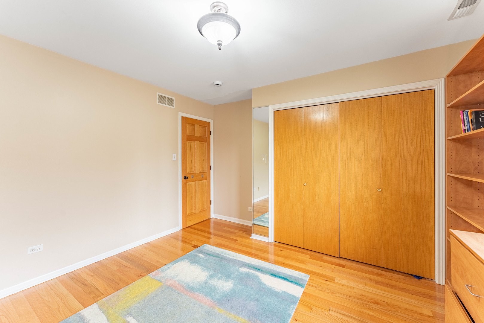 1442 Kinross Street Flossmoor, IL 60422 - Photo 35 of 53 a view of an empty room with wooden floor and a window