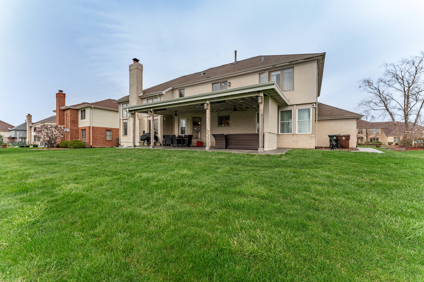 1442 Kinross Street Flossmoor, IL 60422 - Photo 47 of 53 a front view of a house with a yard and large trees