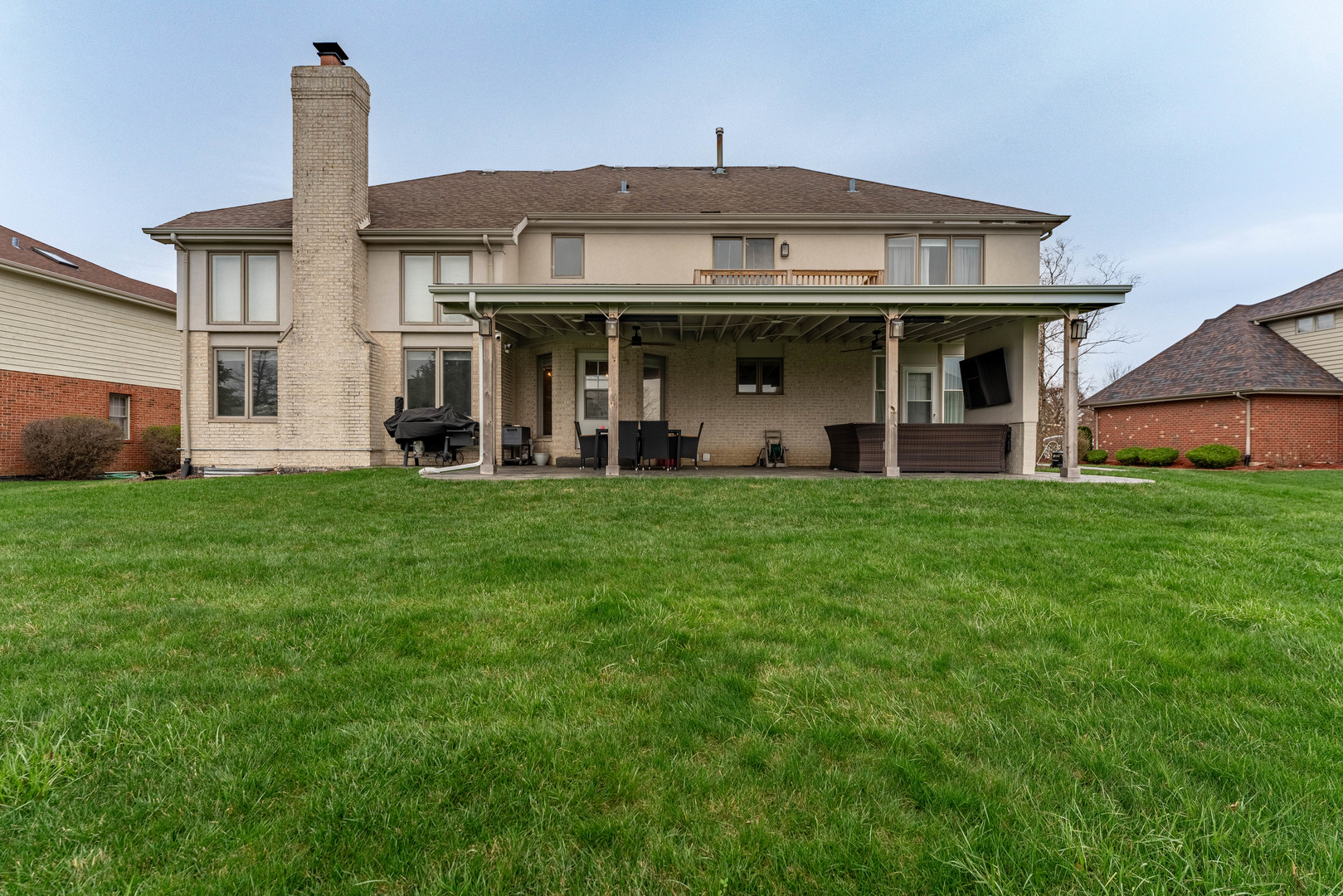 1442 Kinross Street Flossmoor, IL 60422 - Photo 48 of 53 a view of white house with a big yard and potted plants