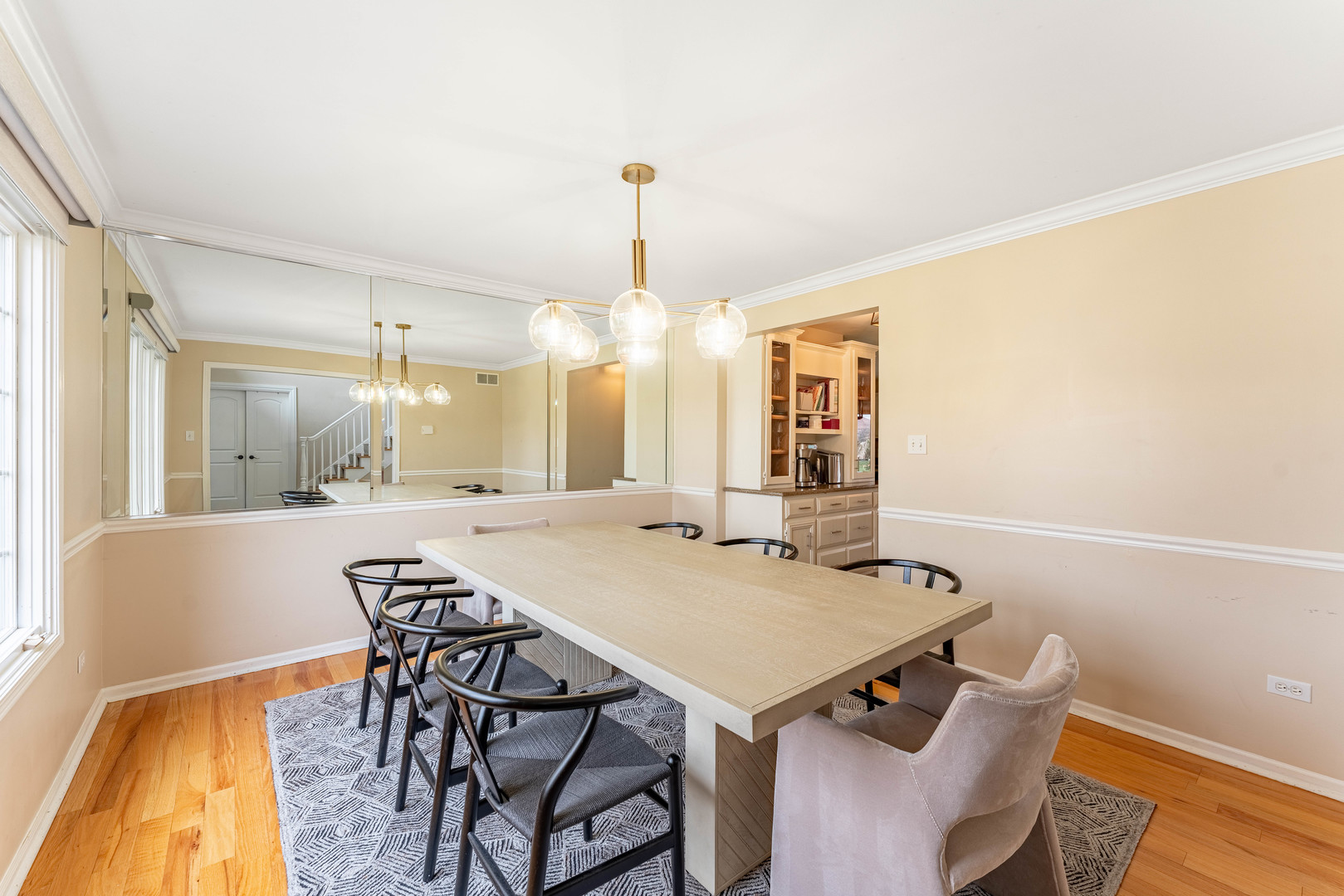 1442 Kinross Street Flossmoor, IL 60422 - Photo 7 of 53 a view of a dining room with furniture and a chandelier