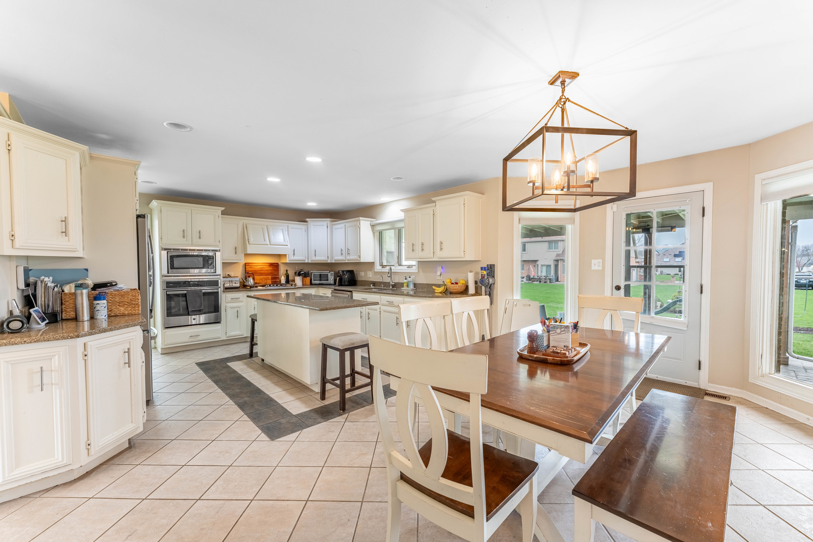 1442 Kinross Street Flossmoor, IL 60422 - Photo 9 of 53 a view of kitchen with dining table and chairs
