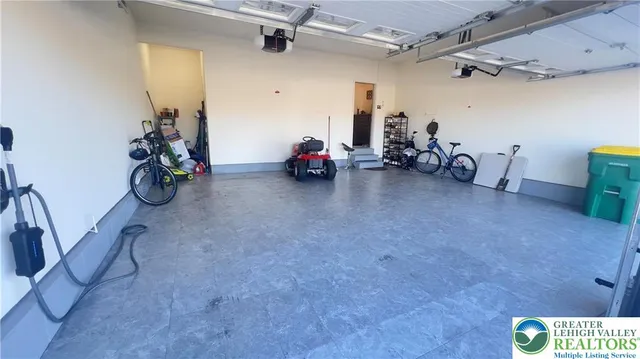a view of a terrace with couches and wooden floor