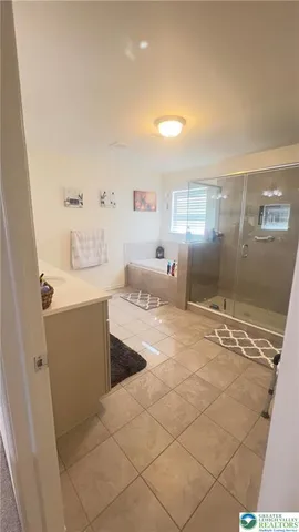 a bathroom with a sink a vanity and a mirror