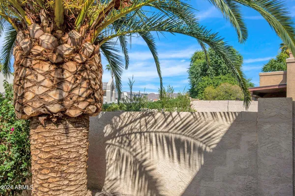 a view of balcony with furniture