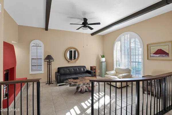 a view of a livingroom with furniture and window