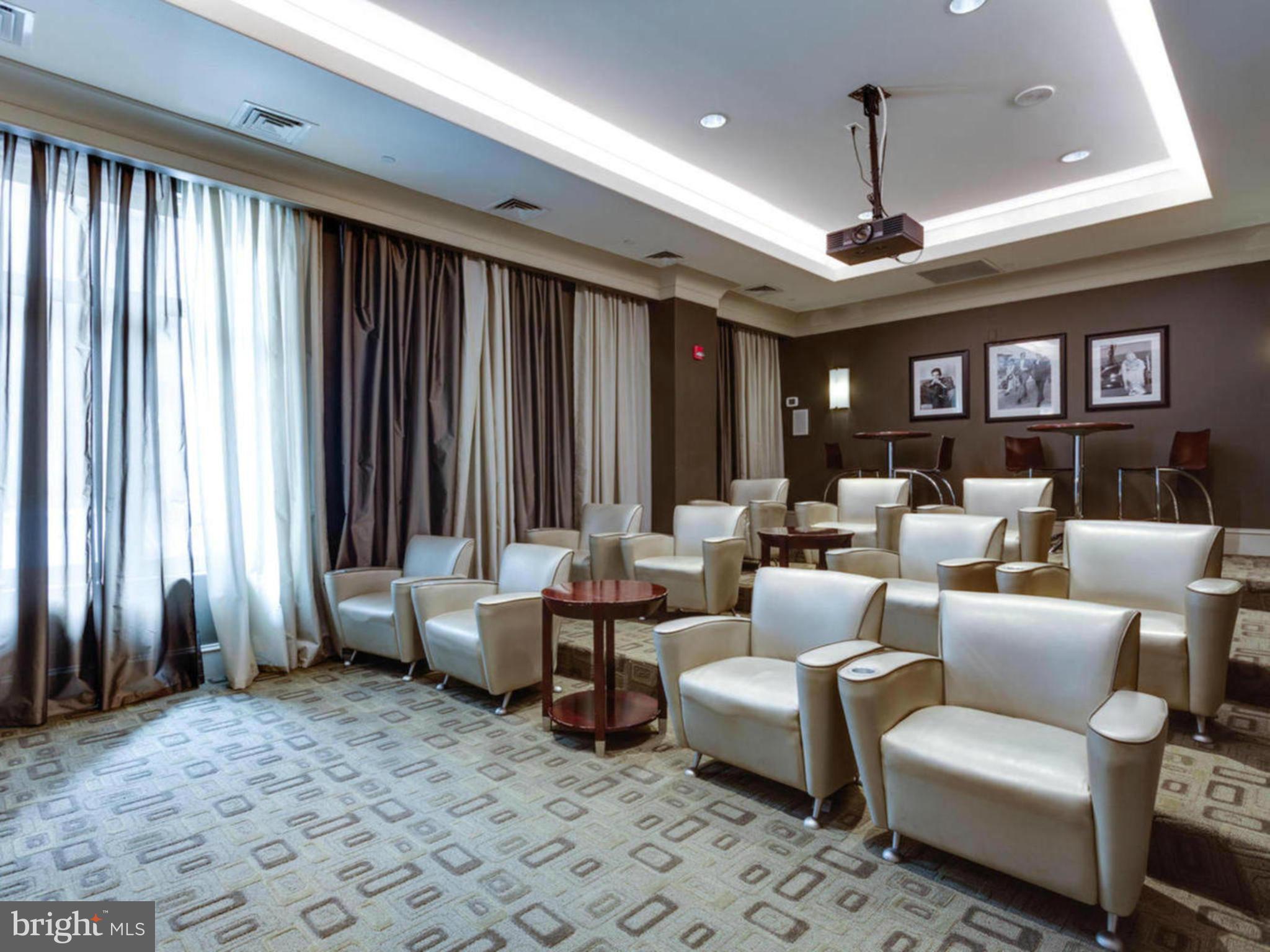 851 North Glebe Road, Unit 403 Arlington, VA 22203 - Photo 22 of 28 a living room with furniture and a large window