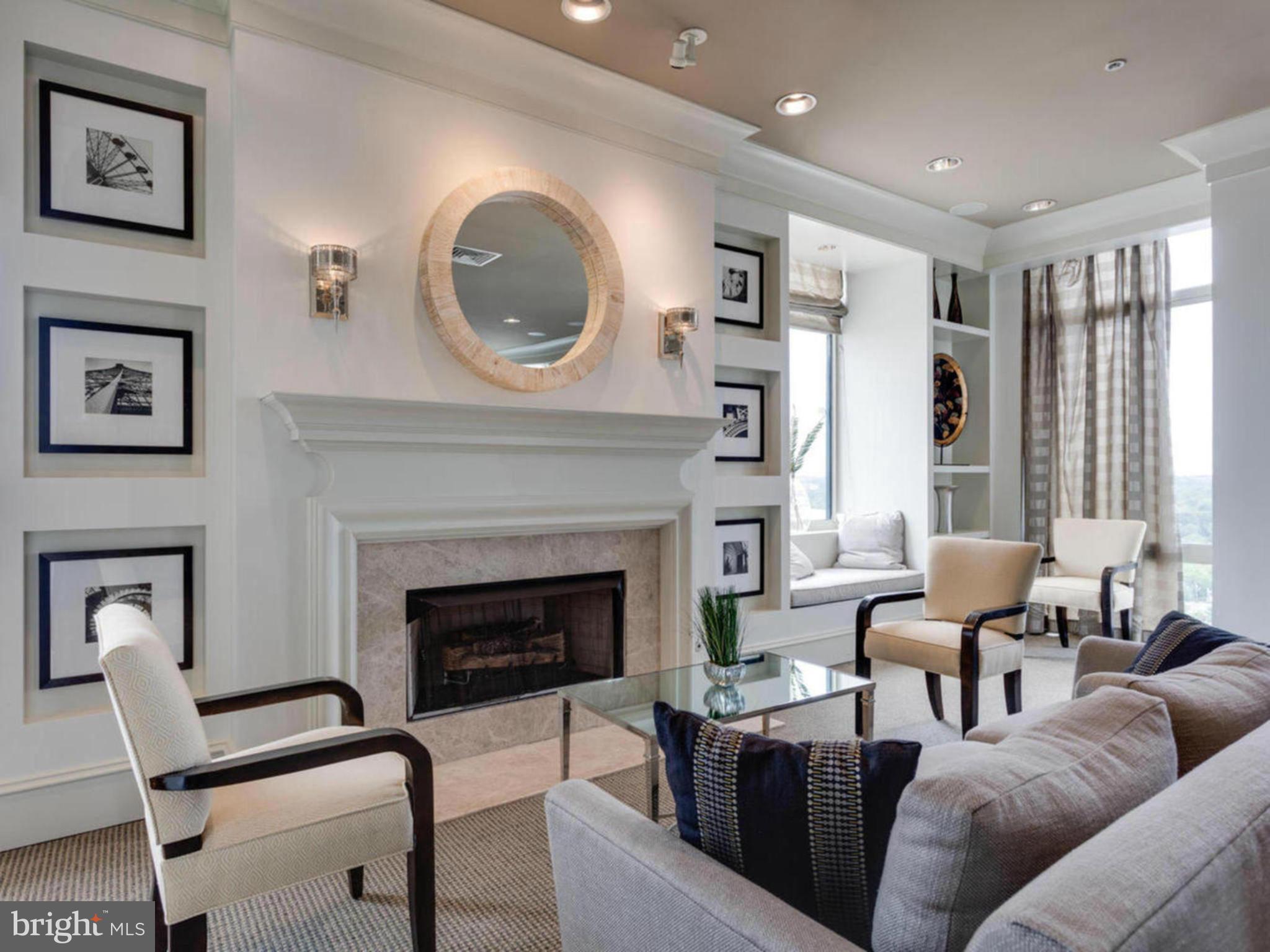 851 North Glebe Road, Unit 403 Arlington, VA 22203 - Photo 25 of 28 a living room with furniture and a fireplace