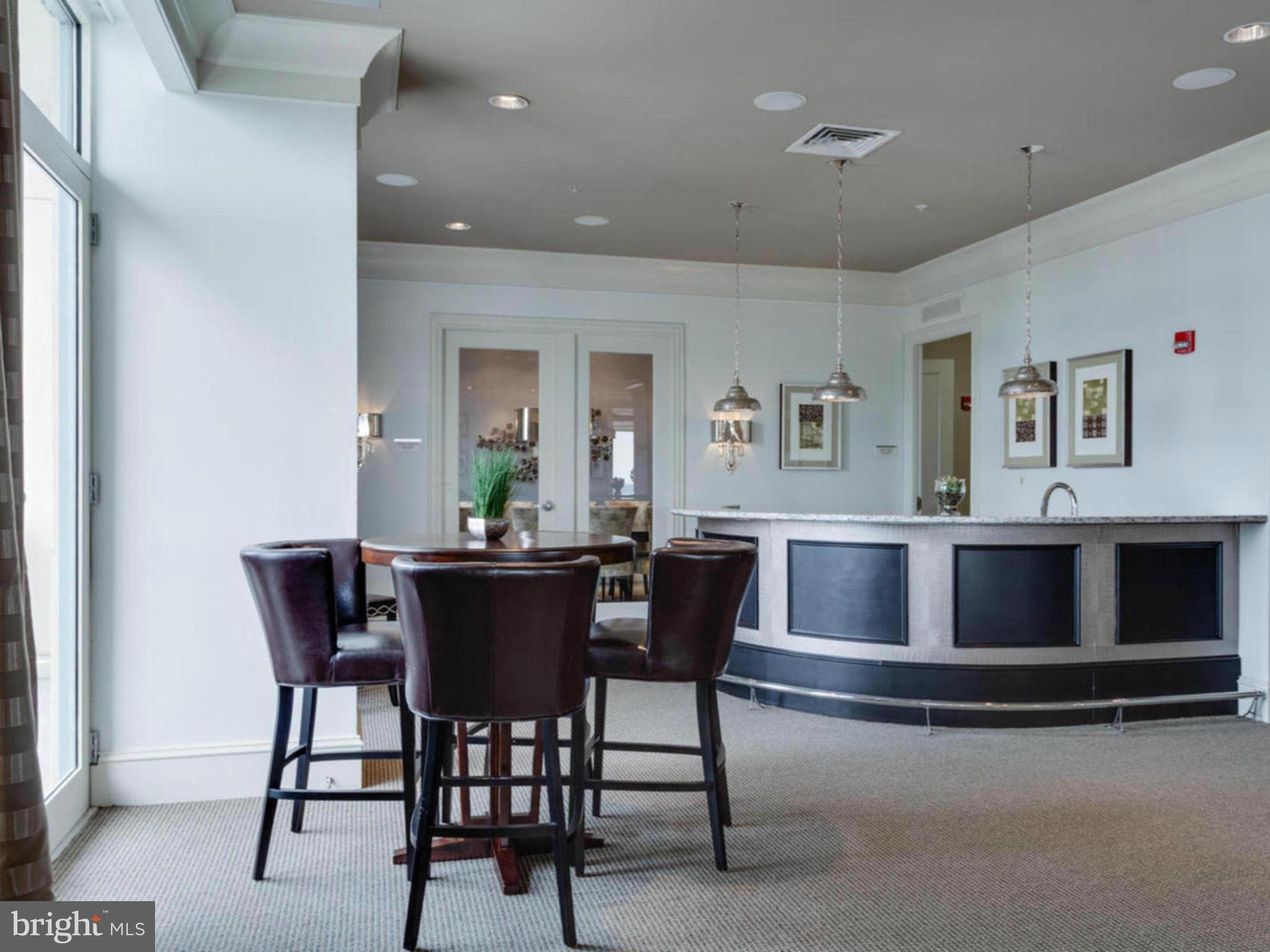 851 North Glebe Road, Unit 403 Arlington, VA 22203 - Photo 27 of 28 a view of a dining room with furniture