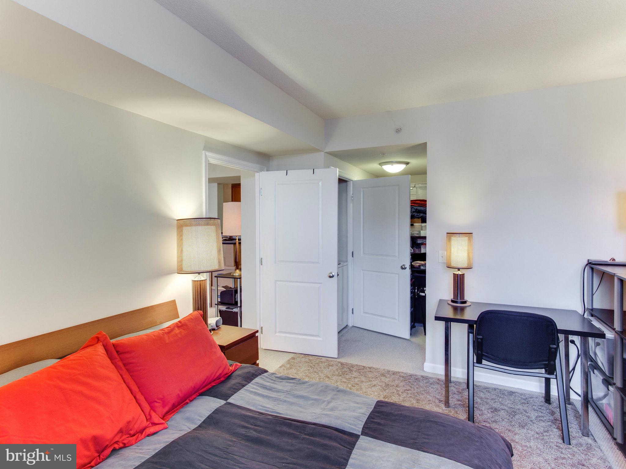 851 North Glebe Road, Unit 403 Arlington, VA 22203 - Photo 10 of 28 a living room with furniture and a wooden floor