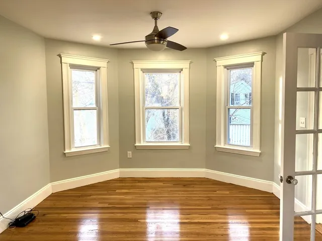 a view of an empty room and window