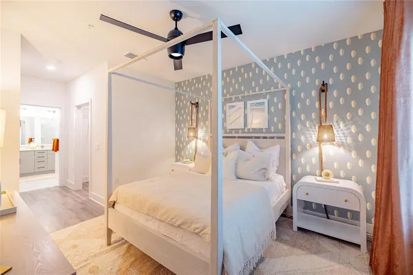 a bathroom with a shower and a bath tub