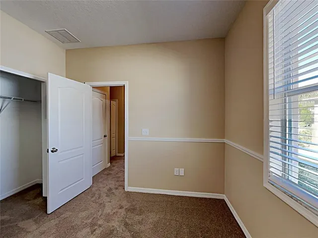 an empty room with closet