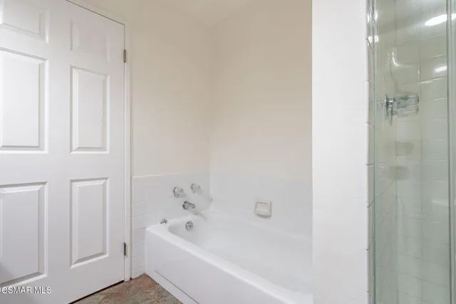 a bathroom with a bathtub