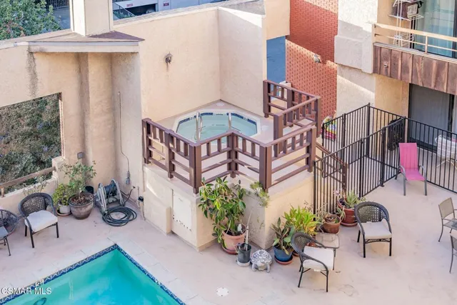 a view of a workspace with furniture