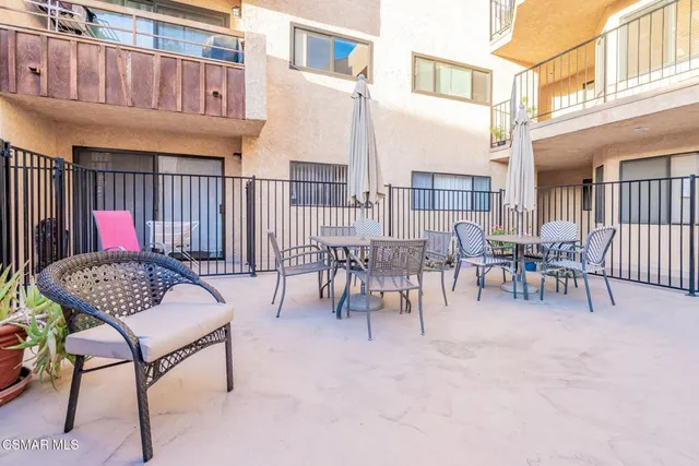 a view of a livingroom with wooden floor
