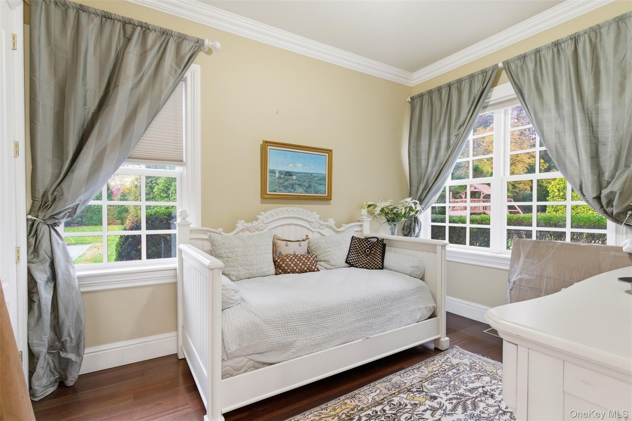 35 Chicken Valley Road Glen Head, NY 11545 - Photo 11 of 47 a bedroom with a bed and a window