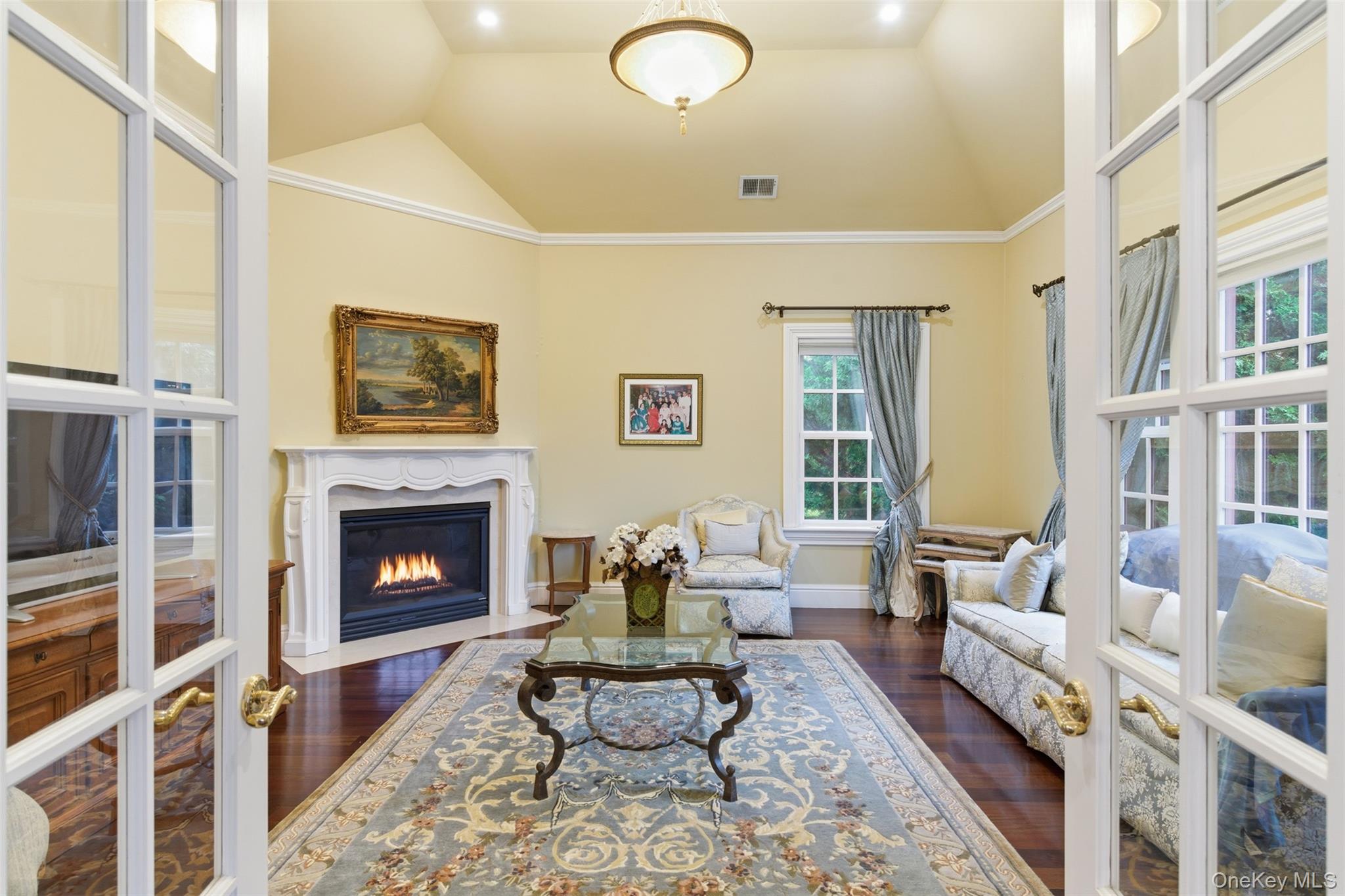 35 Chicken Valley Road Glen Head, NY 11545 - Photo 15 of 47 a living room with furniture and a fireplace