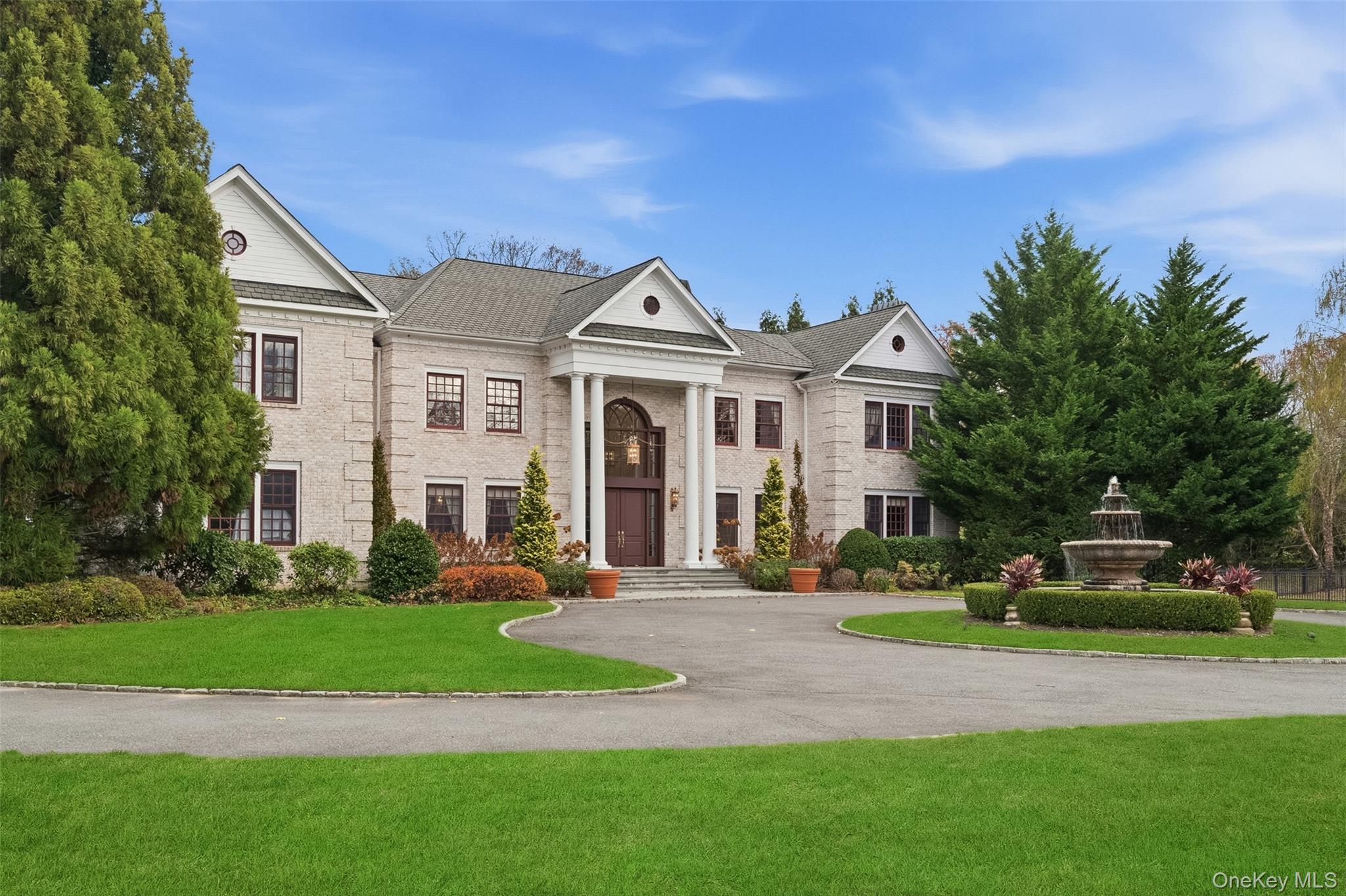35 Chicken Valley Road Glen Head, NY 11545 - Photo 3 of 47 a front view of a house with a garden