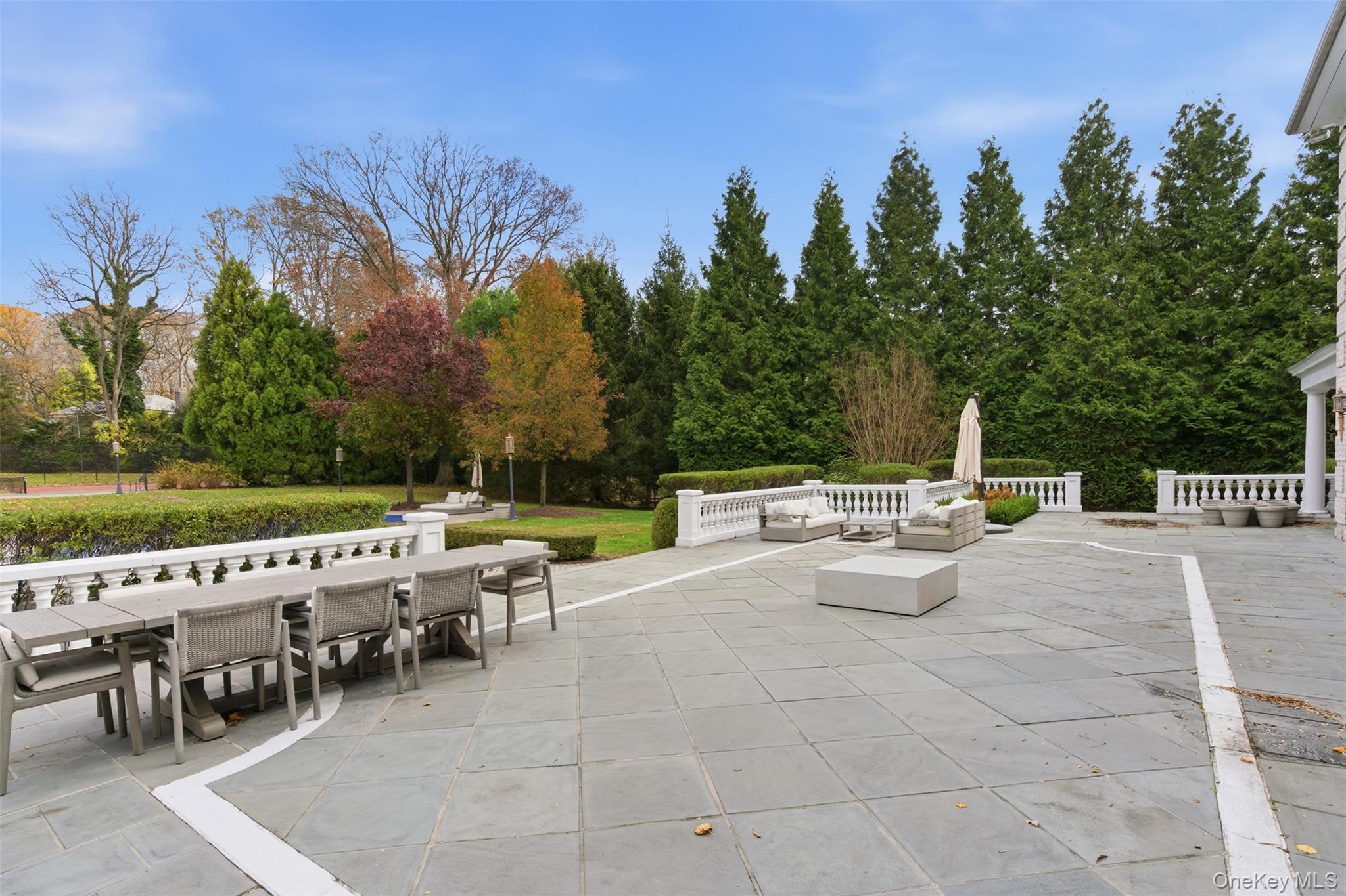 35 Chicken Valley Road Glen Head, NY 11545 - Photo 33 of 47 a view of a patio with swimming pool and sitting area