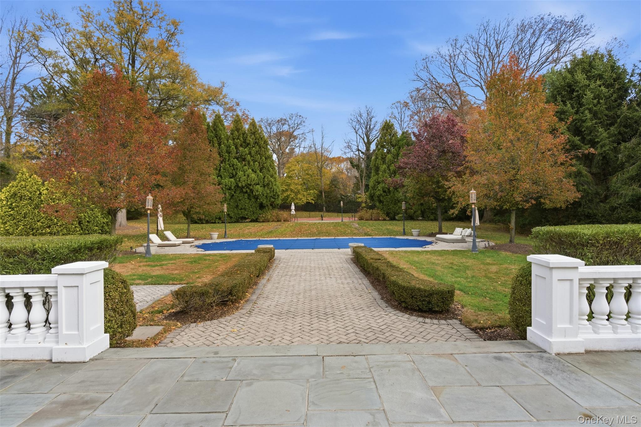 35 Chicken Valley Road Glen Head, NY 11545 - Photo 35 of 47 a view of a swimming pool with a yard