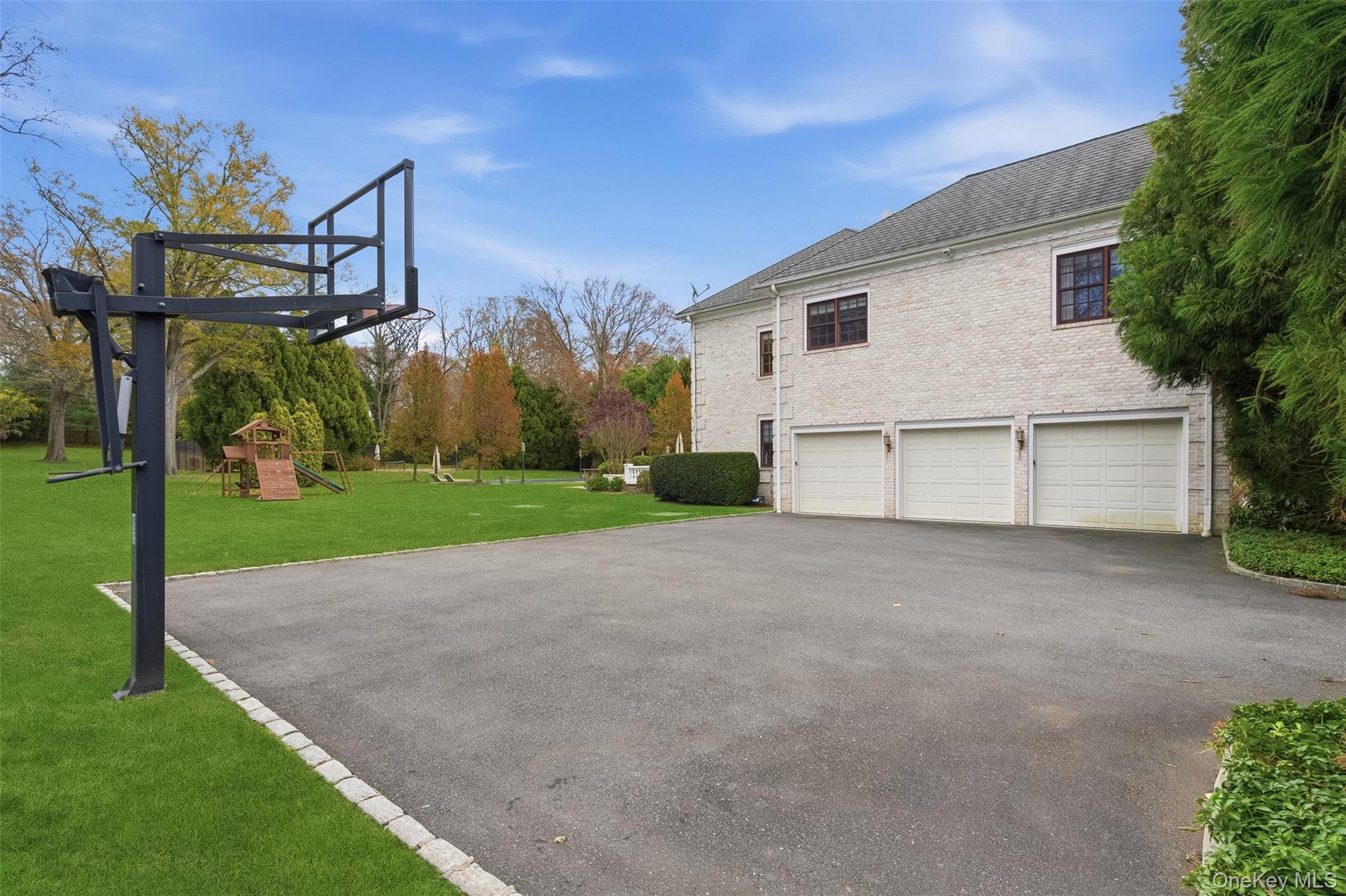 35 Chicken Valley Road Glen Head, NY 11545 - Photo 36 of 47 a view of a house with backyard and trees