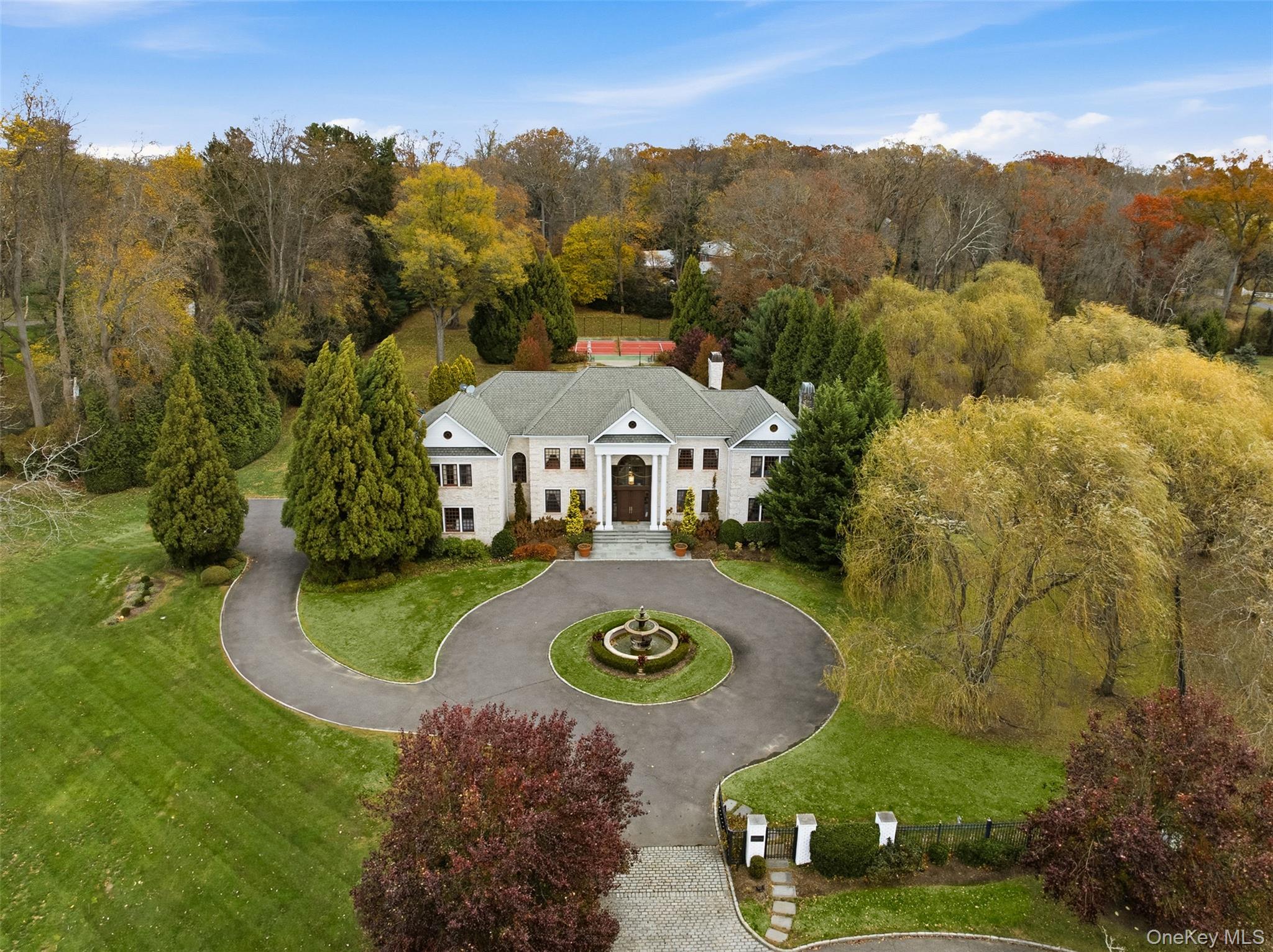 35 Chicken Valley Road Glen Head, NY 11545 - Photo 42 of 47 an aerial view of a house with yard swimming pool and mountains