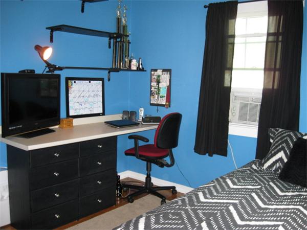 15 Joseph Street Acushnet, MA 02743 - Photo 13 of 22 a view of a workspace with furniture and a flat screen tv
