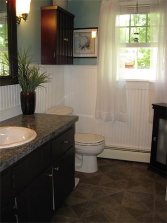 15 Joseph Street Acushnet, MA 02743 - Photo 14 of 22 a bathroom with a granite countertop sink toilet and mirror
