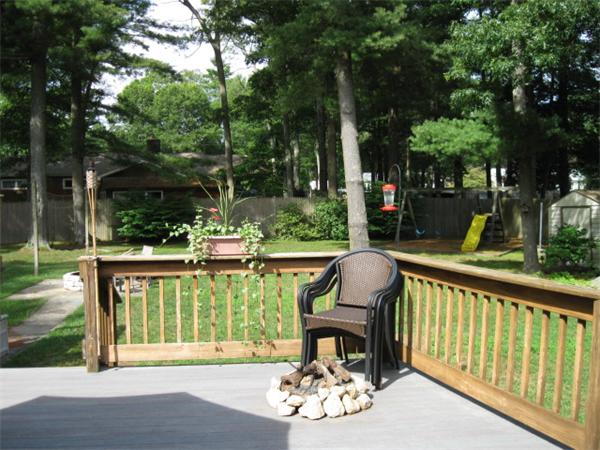 15 Joseph Street Acushnet, MA 02743 - Photo 18 of 22 a view of a two chairs in the deck