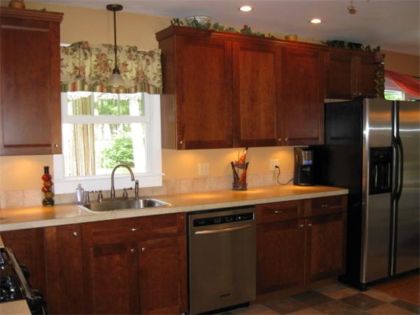 15 Joseph Street Acushnet, MA 02743 - Photo 5 of 22 a kitchen with a sink a refrigerator and window
