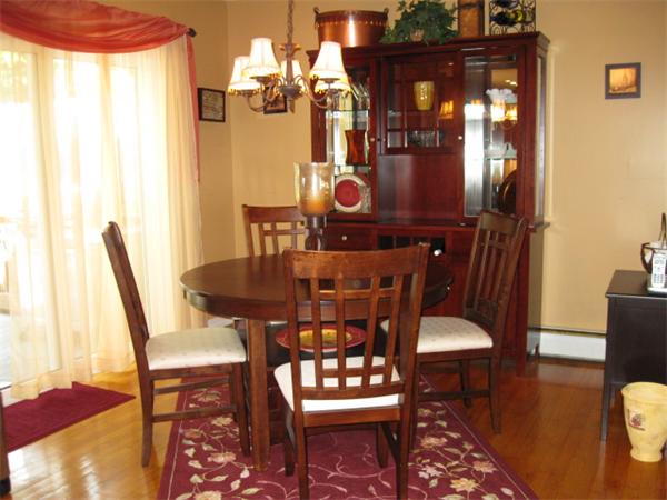 15 Joseph Street Acushnet, MA 02743 - Photo 9 of 22 a view of a dining room with furniture and chandelier