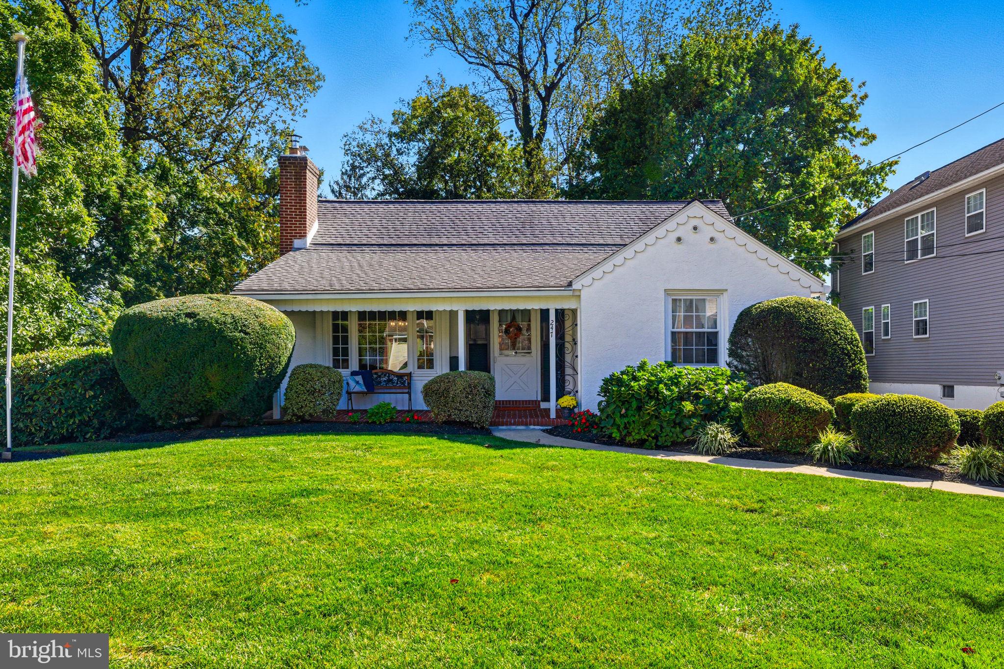 247 Orchard Road Springfield, PA 19064 - Photo 1 of 30 a view of a house with a garden and swimming pool