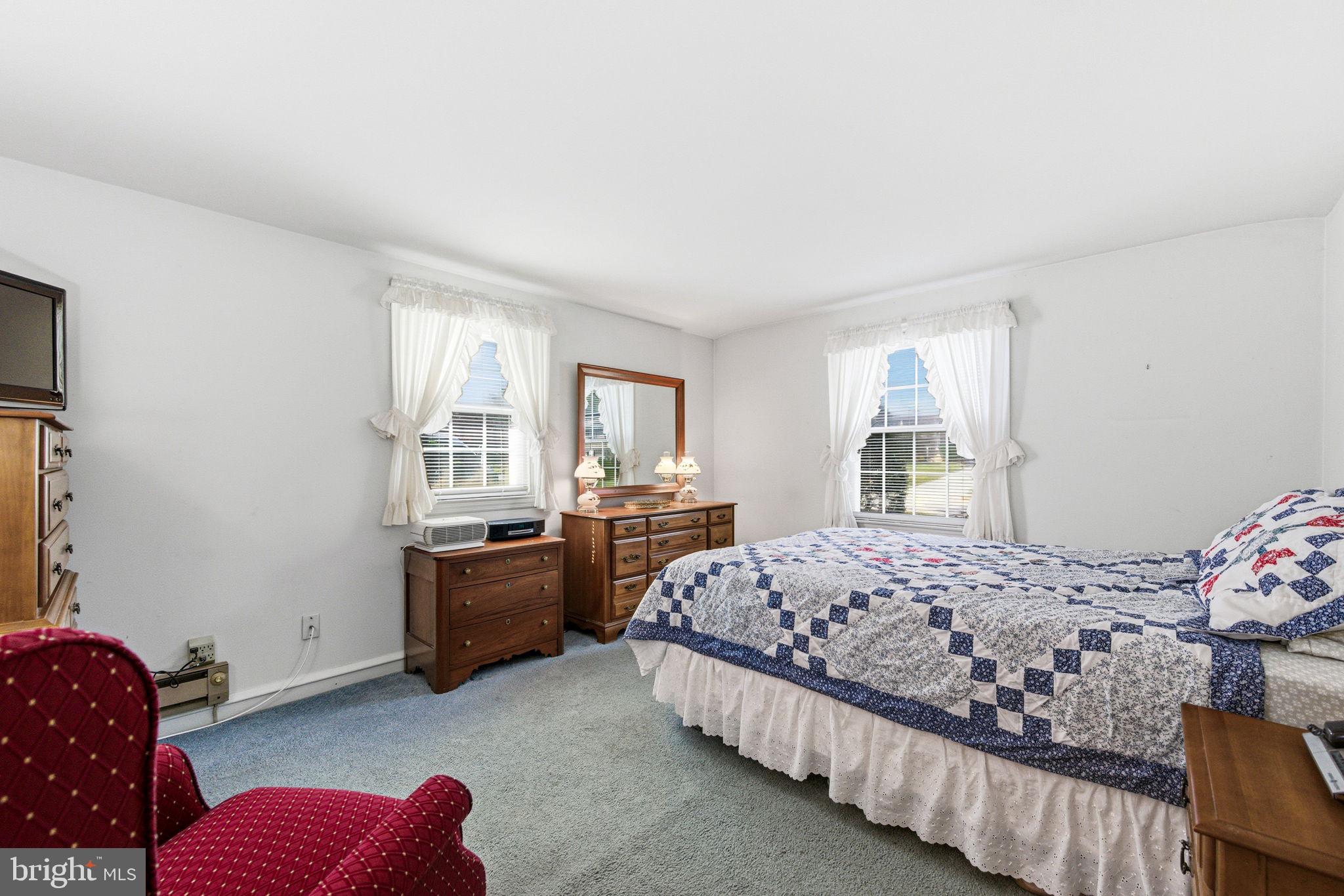 247 Orchard Road Springfield, PA 19064 - Photo 13 of 30 a bedroom with a bed and a window