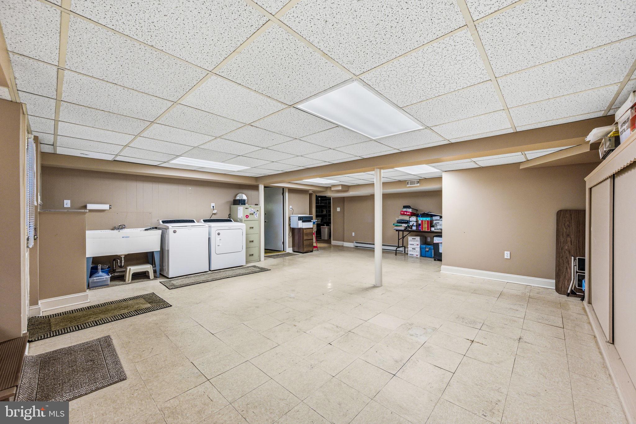 247 Orchard Road Springfield, PA 19064 - Photo 19 of 30 a view of a livingroom with furniture and a window