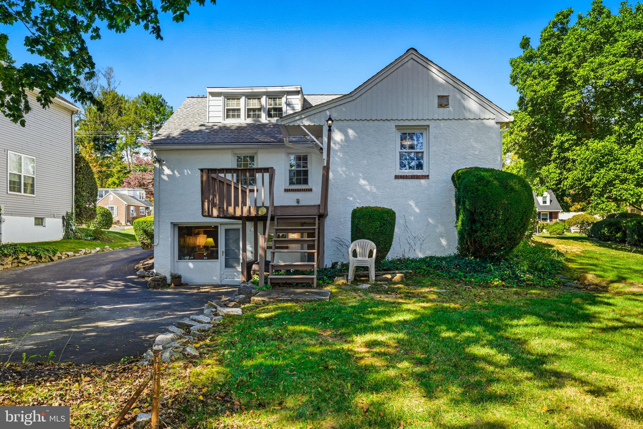 247 Orchard Road Springfield, PA 19064 - Photo 24 of 30 a front view of a house with garden