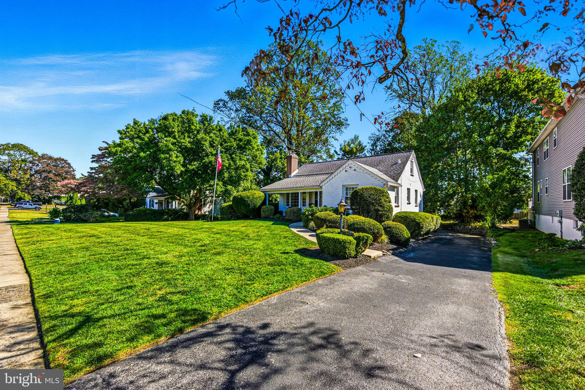 247 Orchard Road Springfield, PA 19064 - Photo 3 of 30 a front view of a house with garden