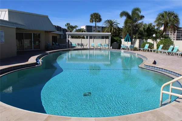 a view of a swimming pool and outdoor space