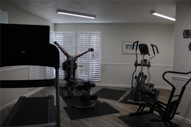 a view of a livingroom with furniture and window