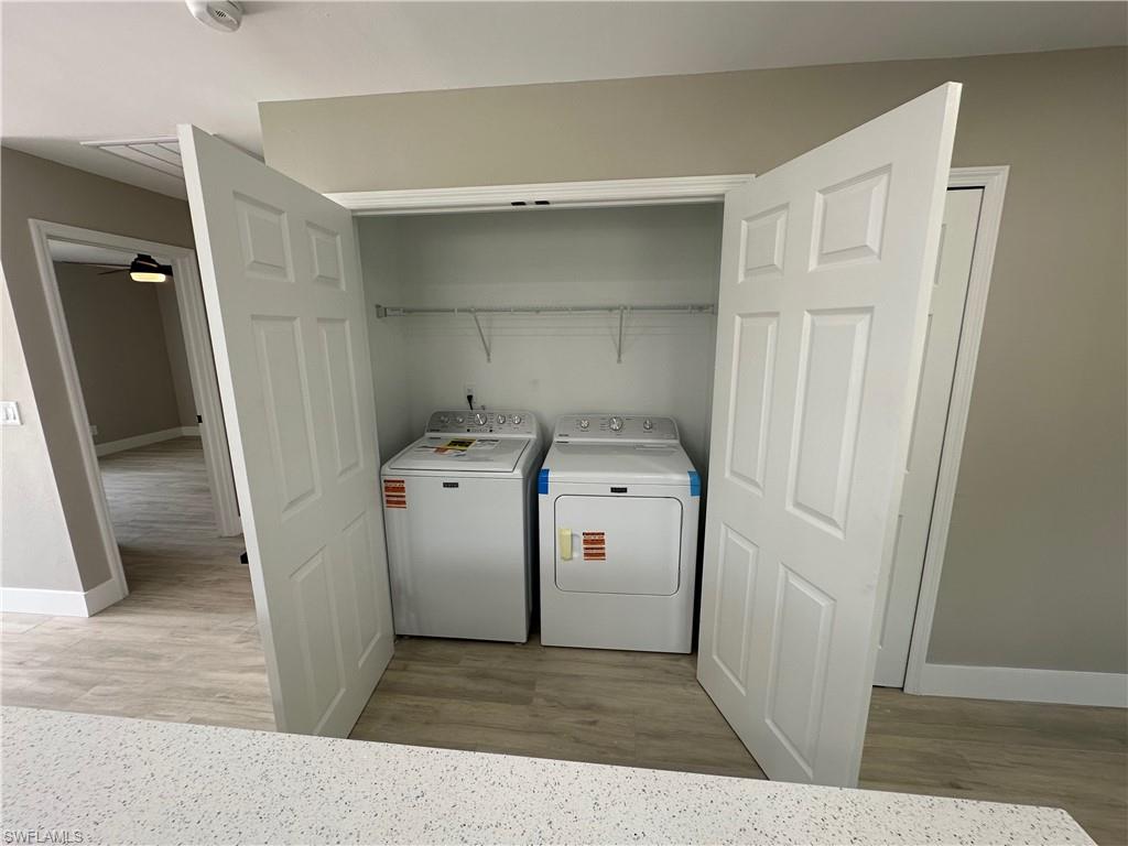 9165 Seville Road Fort Myers, FL 33967 - Photo 8 of 19 a view of a storage & utility room with a washer dryer