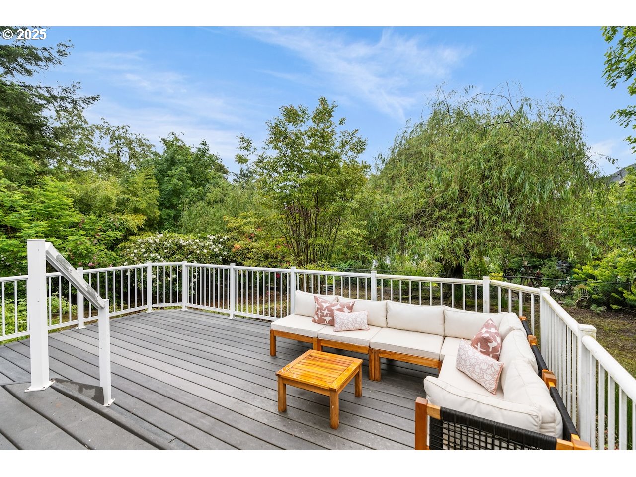 2910 Southwest Miles Street Portland, OR 97219 - Photo 30 of 39 a view of a roof deck with chair and wooden floor
