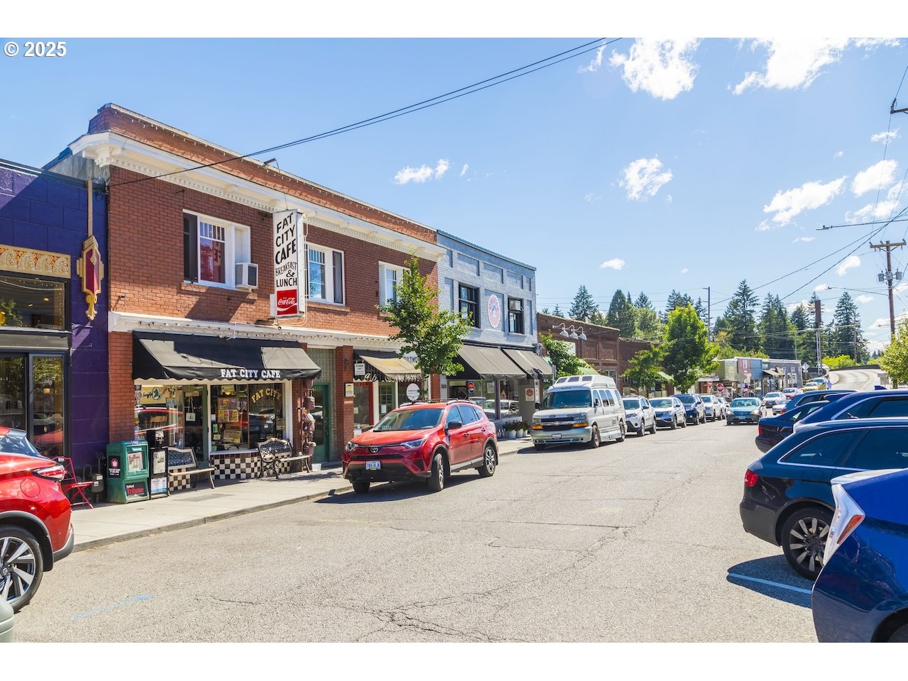 2910 Southwest Miles Street Portland, OR 97219 - Photo 38 of 39 a cars parked in front of a store