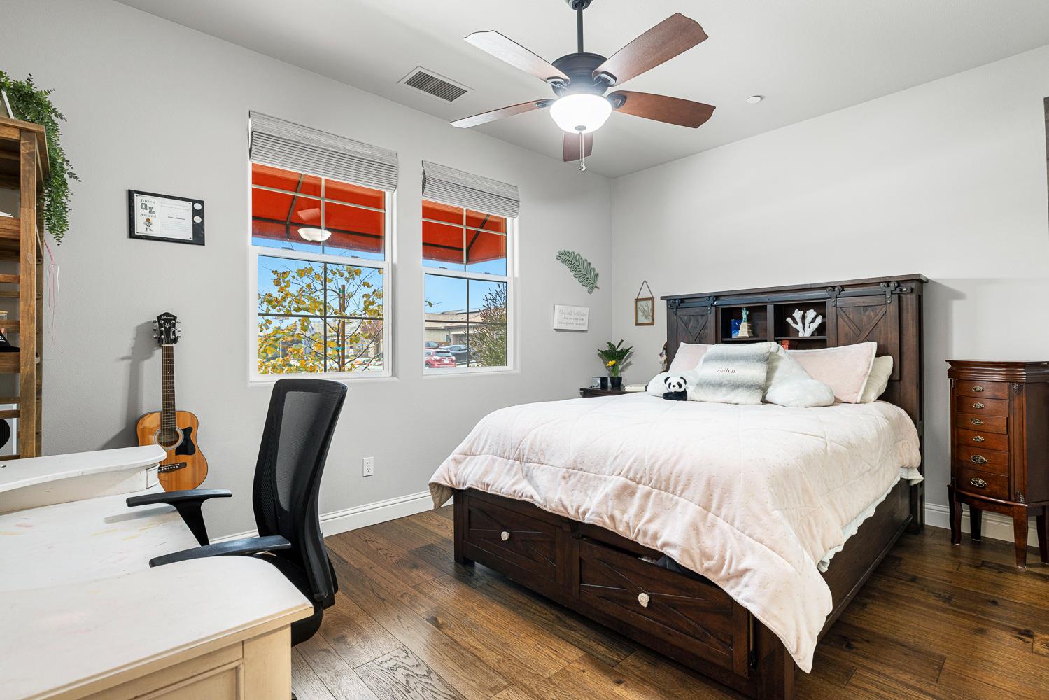 3293 Soledad Avenue Clovis, CA 93619 - Photo 24 of 37 a bedroom with a bed and a large window