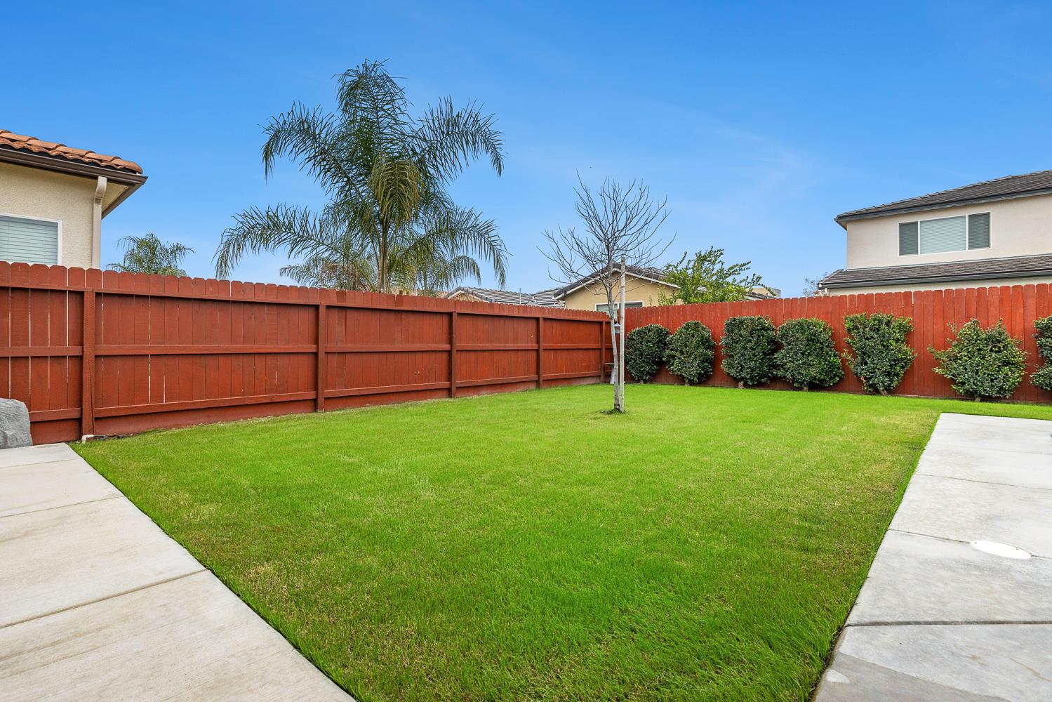 3293 Soledad Avenue Clovis, CA 93619 - Photo 35 of 37 a view of a backyard with a garden