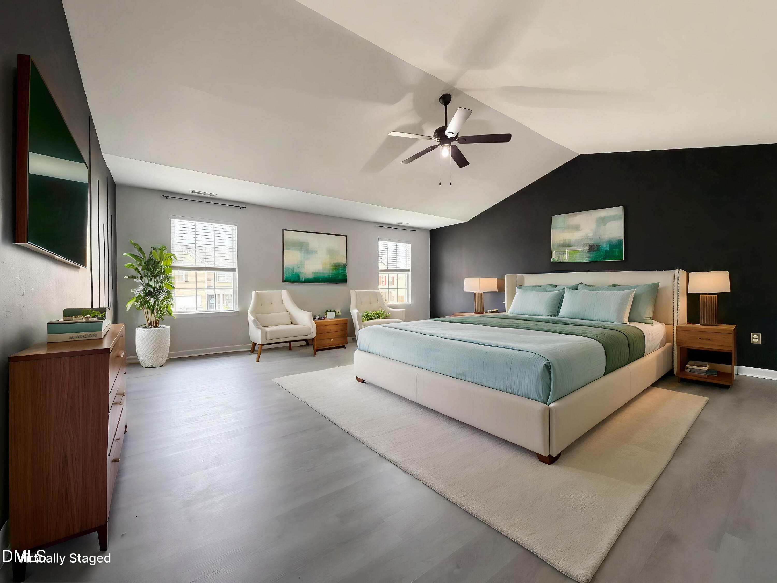 574 Botanical Court Bunnlevel, NC 28323 - Photo 11 of 20 a bedroom with a large bed a flat tv screen and a bookshelf