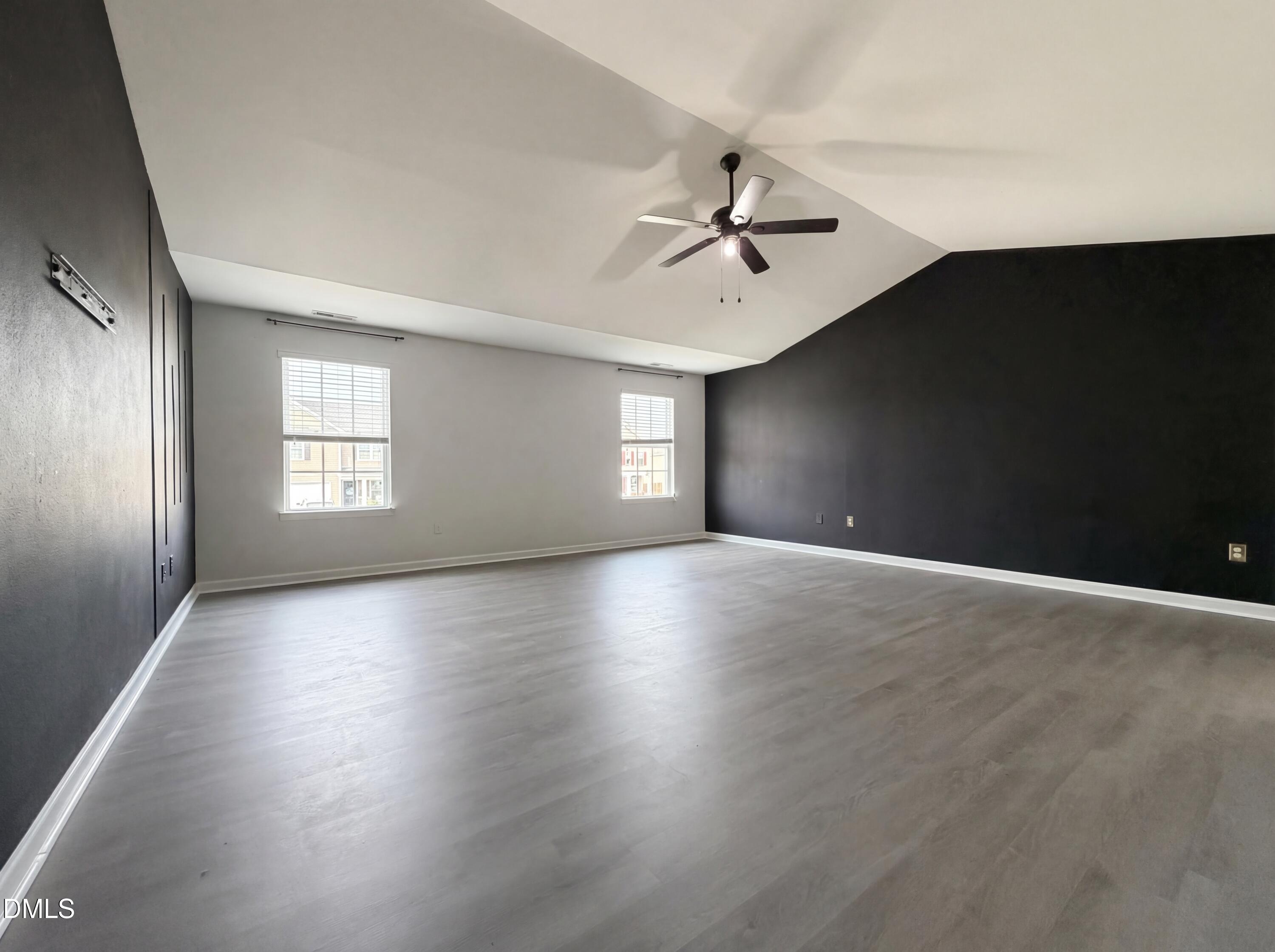 574 Botanical Court Bunnlevel, NC 28323 - Photo 12 of 20 a view of empty room with windows